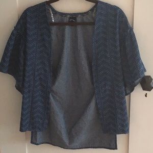 Ocean blue sweater with a chevron pattern.